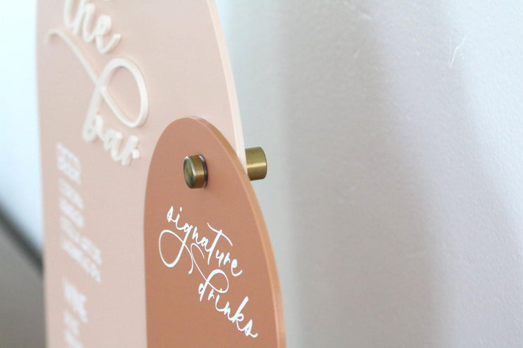 acrylic arch bar and signature drinks sign | acrylic wedding sign | wedding decor | unique | the bar | reception | bar table | luxe