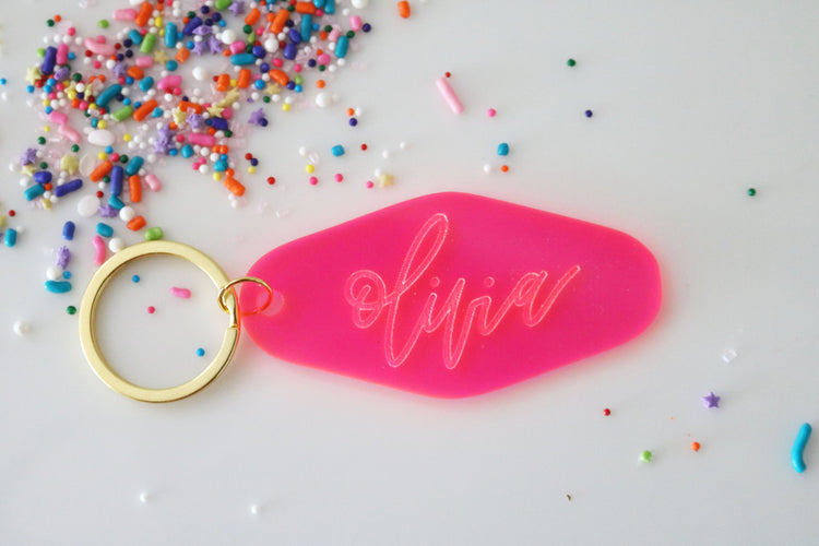 custom calligraphy name motel keychain | clear or fluorescent pink