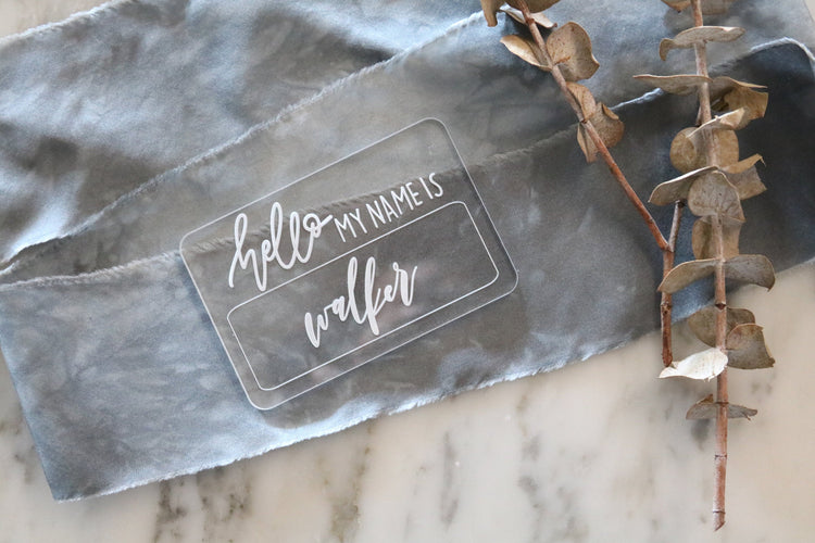 custom hand lettered 'hello my name is' acrylic sign