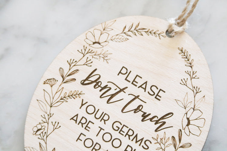 don't touch baby car seat wood tag