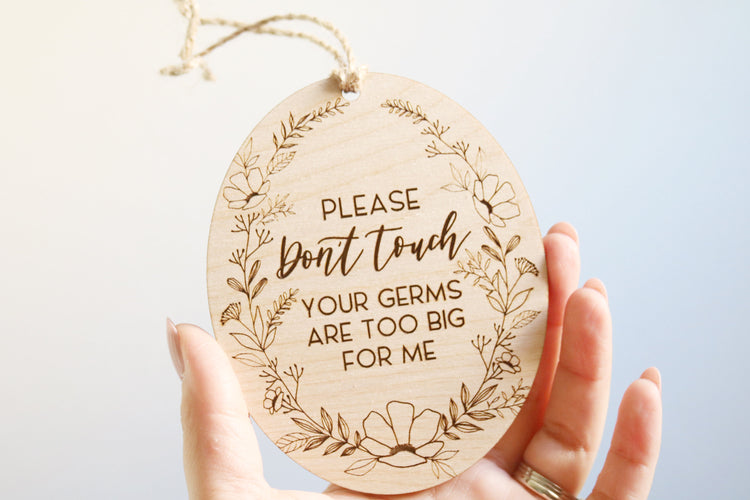 don't touch baby car seat wood tag