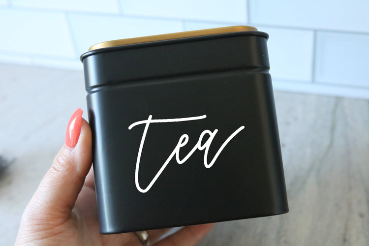 calligraphy black tea or coffee tin canister