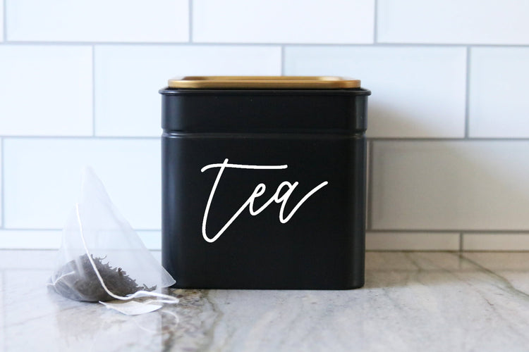 calligraphy black tea or coffee tin canister