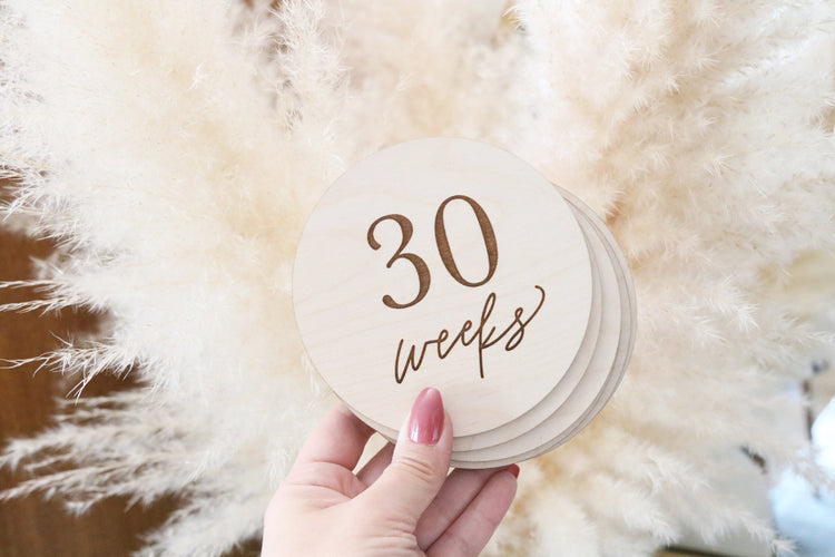 set of wood pregnancy weeks milestone signs