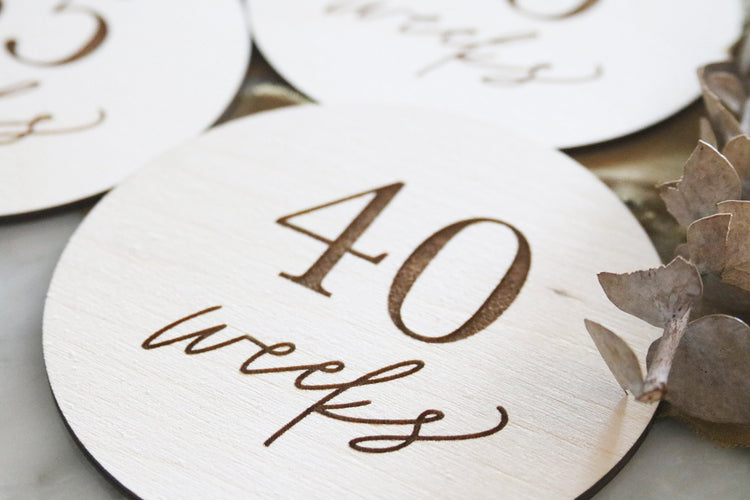 set of wood pregnancy weeks milestone signs
