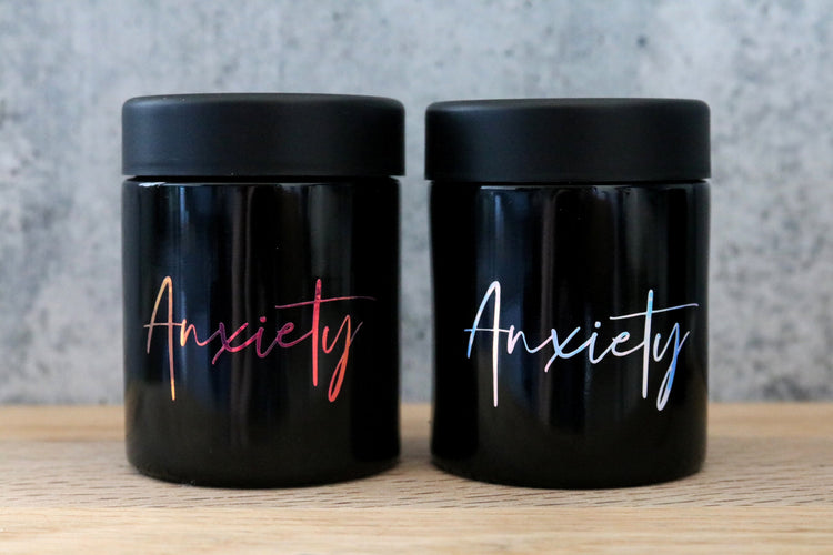 custom labeled black glass stash jar