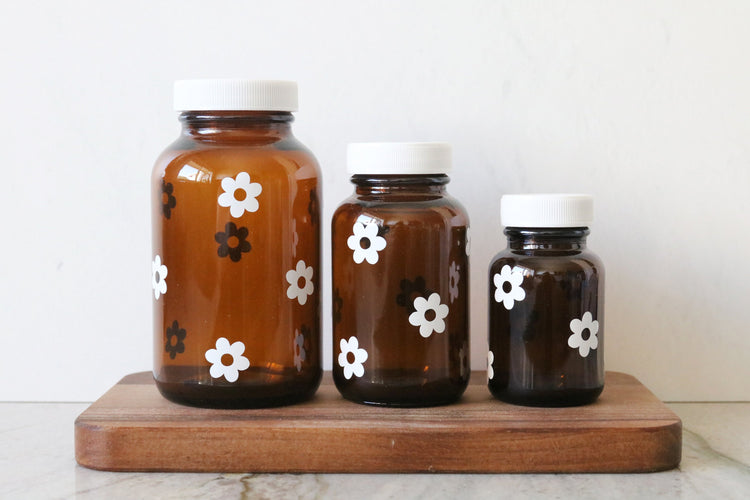 retro daisy flower amber glass pill bottle | 3 sizes