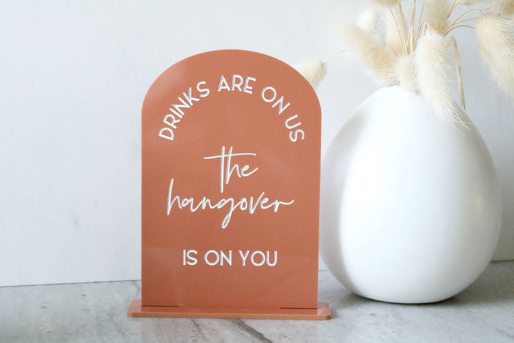 acrylic drinks are on us hangover bar sign | acrylic wedding sign | wedding decor | signature drinks | reception | bar table | bar | alcohol