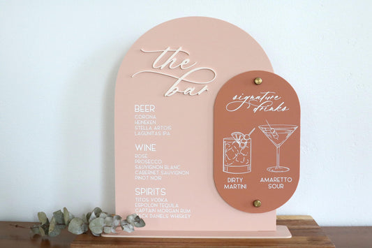 acrylic arch bar and signature drinks sign | acrylic wedding sign | wedding decor | unique | the bar | reception | bar table | luxe