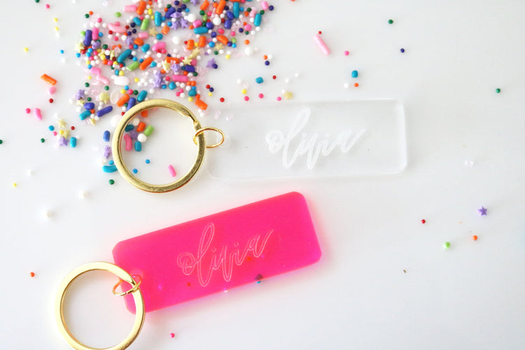 custom calligraphy name keychain | clear or fluorescent pink