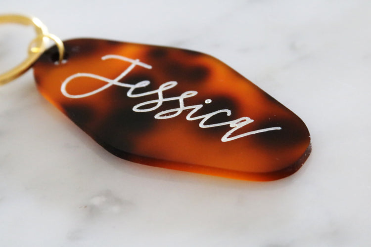 custom tortoise shell motel keychain