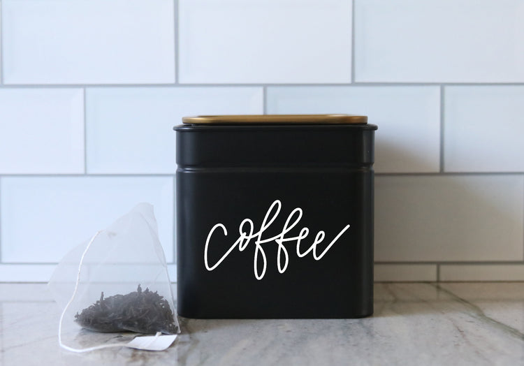 calligraphy black tea or coffee tin canister