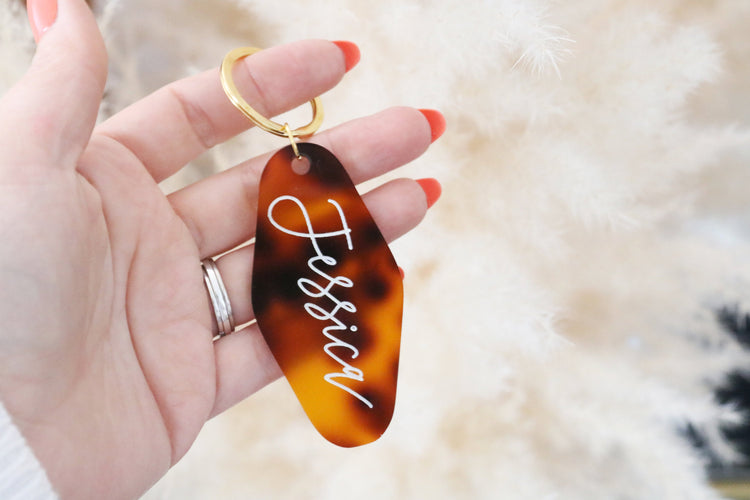 custom tortoise shell motel keychain