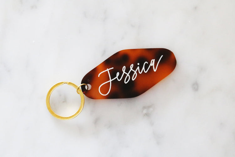 custom tortoise shell motel keychain