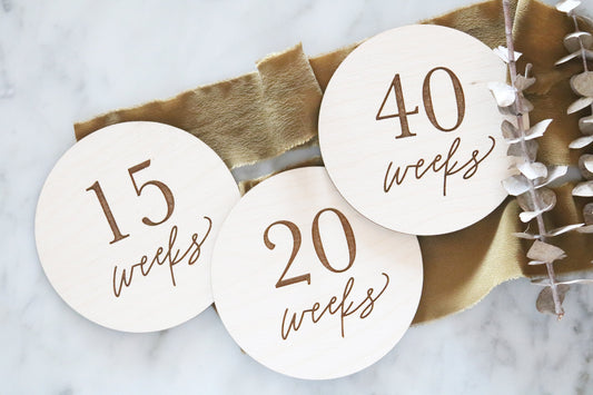 set of wood pregnancy weeks milestone signs