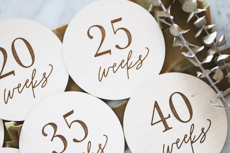 set of wood pregnancy weeks milestone signs