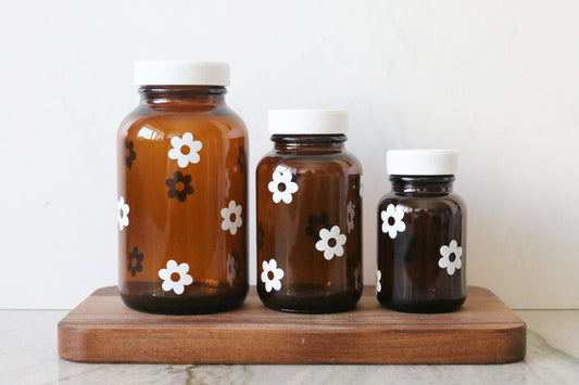 retro daisy flower amber glass pill bottle | 3 sizes