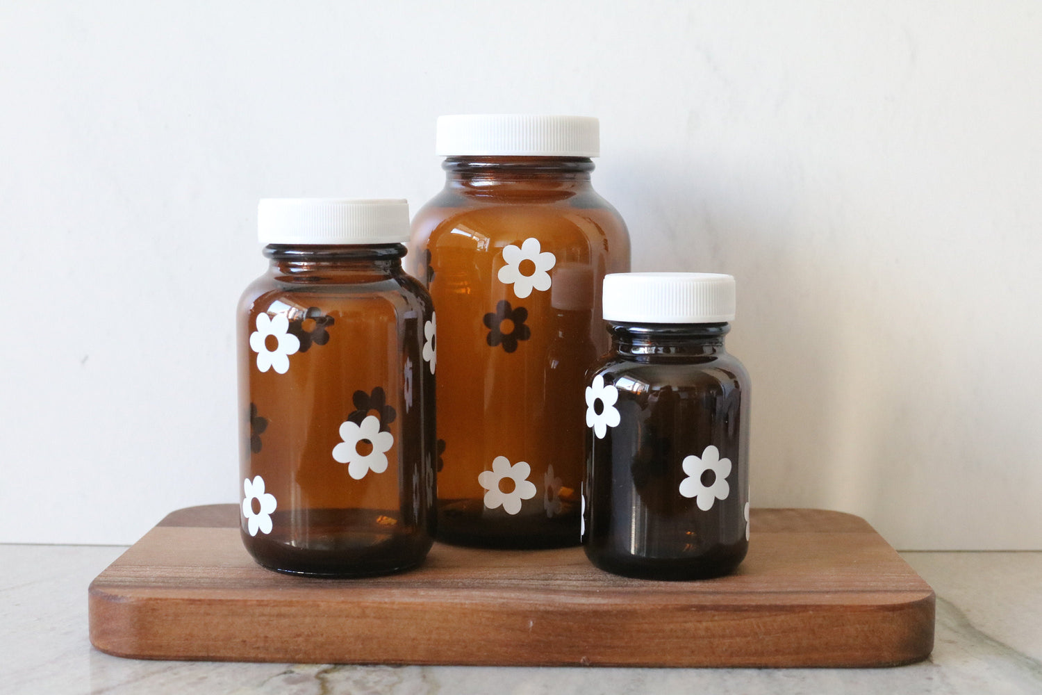 retro daisy flower amber glass pill bottle