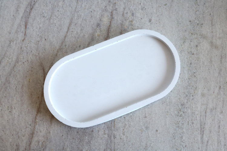 soap dispenser white concrete dish tray